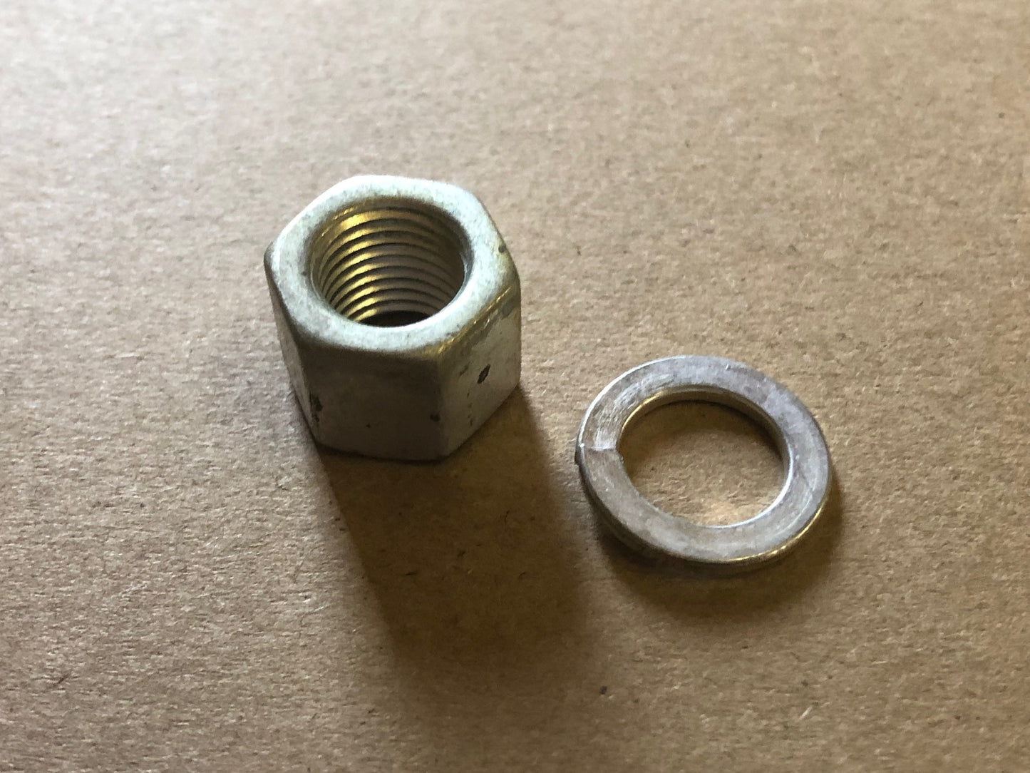 0134 // Nut, 7/16"-20 UNF x 1/2" x 5/8", cadmium plated